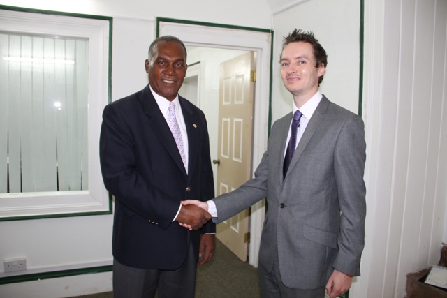 (L-R) Premier of Nevis Hon. Vance Amory at his Bath Plain Office with Martin Robinson, Head of Politics, Press and Public Affairs at the British High Commission in Bridgetown, Barbados on April 30, 2014